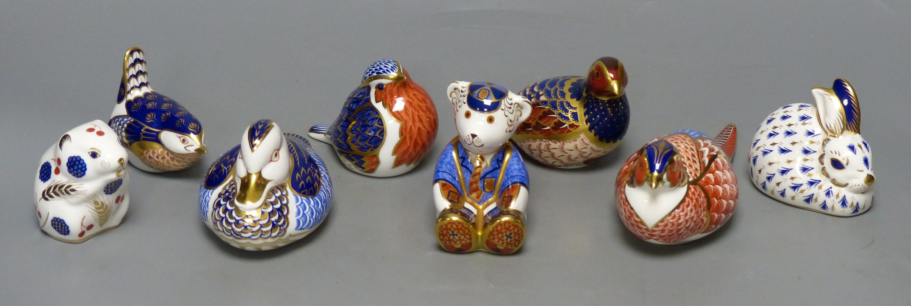Eight Royal Crown Derby animal or bird paperweights